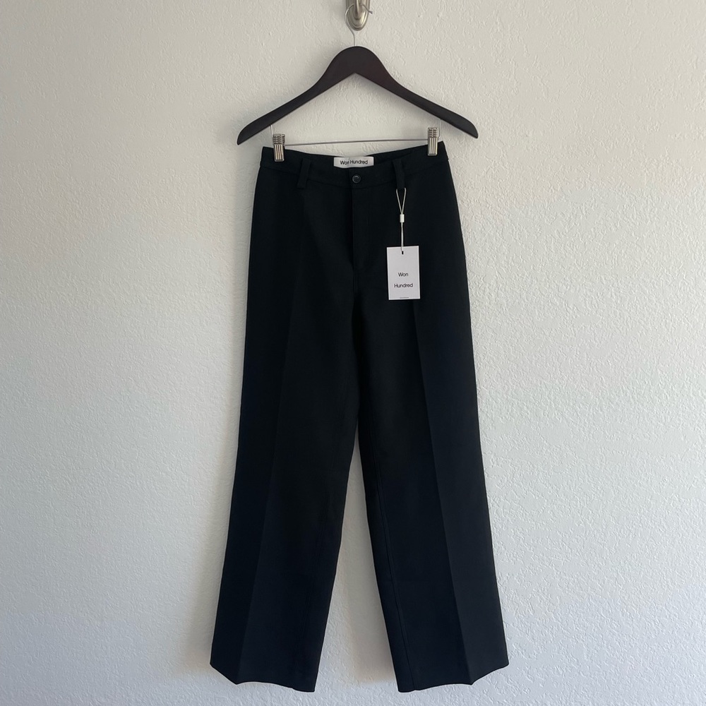 Won Hundred black high waisted trousers with slightly flailed leg. Size 4.